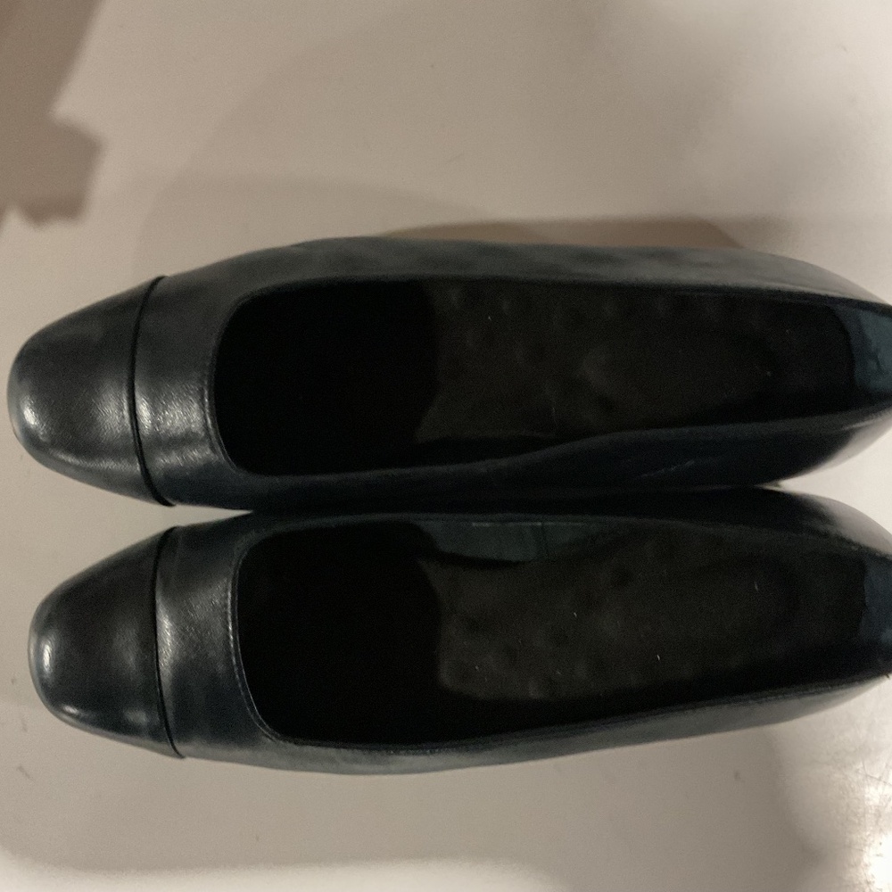 Woman’s blue “flats” size 8w